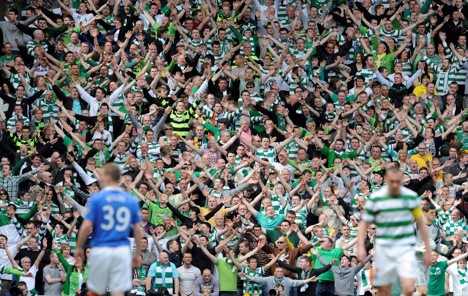 FILE PHOTO: Celtic fans show their support for manager Neil Lennon during their 0-0 draw with Rangers in a Scottish Premier League clash at Ibrox Stadium, Glasgow.