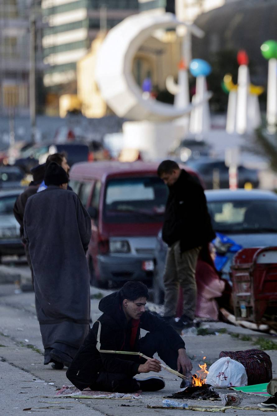 Displaced people from the southern suburbs, gather at Martyrs' Square in Beirut