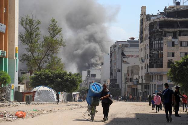 Aftermath of Israeli strikes on residential buildings, in Gaza City