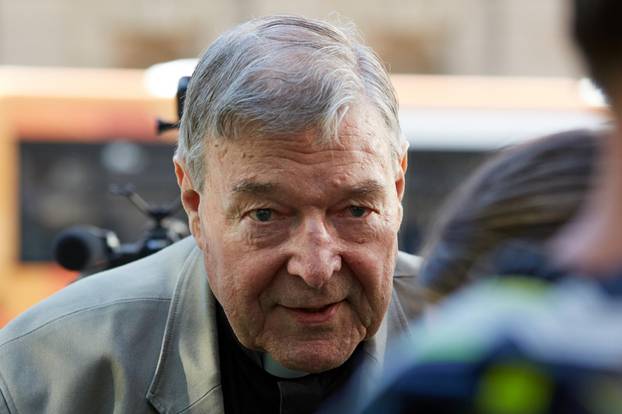 Cardinal George Pell arrives at County Court in Melbourne