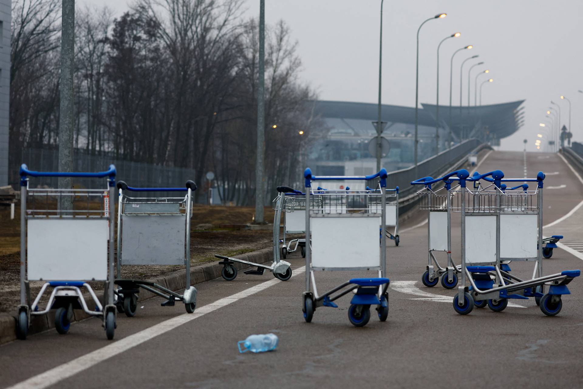 Luggage carts are seen at Kyiv Airport after Russian President Vladimir Putin authorized a military operation in eastern Ukraine