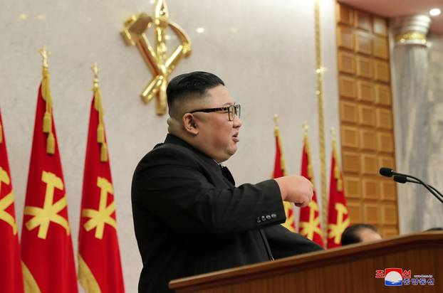 KCNA image of North Korean leader Kim Jong Un at a plenary meeting of the Workers