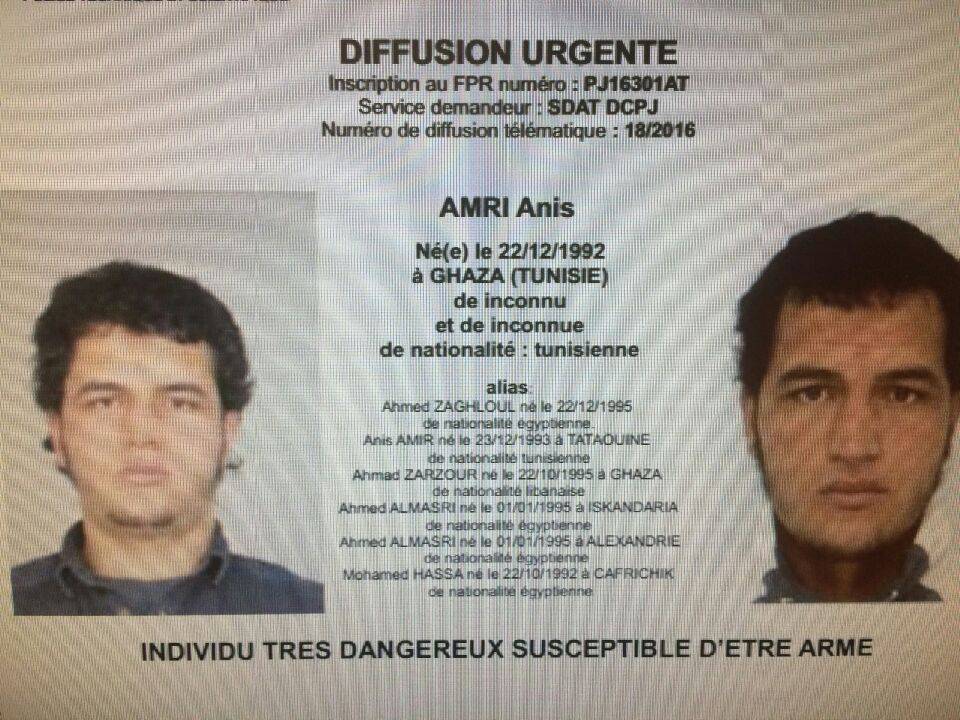A police record with the title, "Urgent Distribution" (Top) and "Very dangerous individual who could be armed"  (Bottom) shows suspect Anis Amri who is sought in relation with the Monday's truck attack on a Christmas market in Berlin