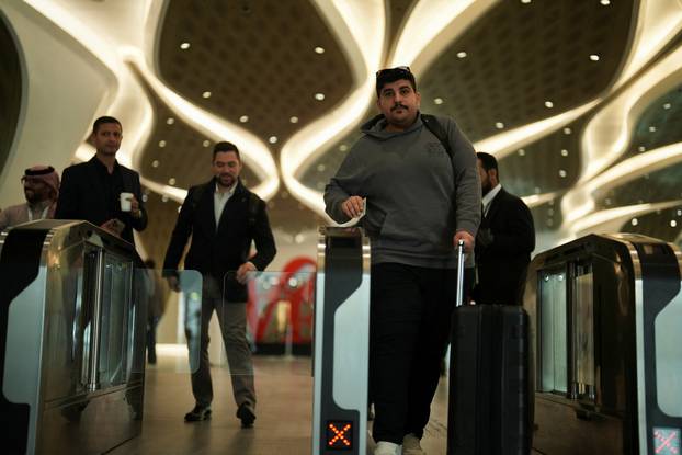 Passengers arrive at the King Abdullah Financial District Metro Station in Riyadh