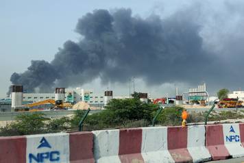 Smoke billows from Jebel Ali port after an Iranian attack, following United States and Israel strikes on Iran, in Dubai