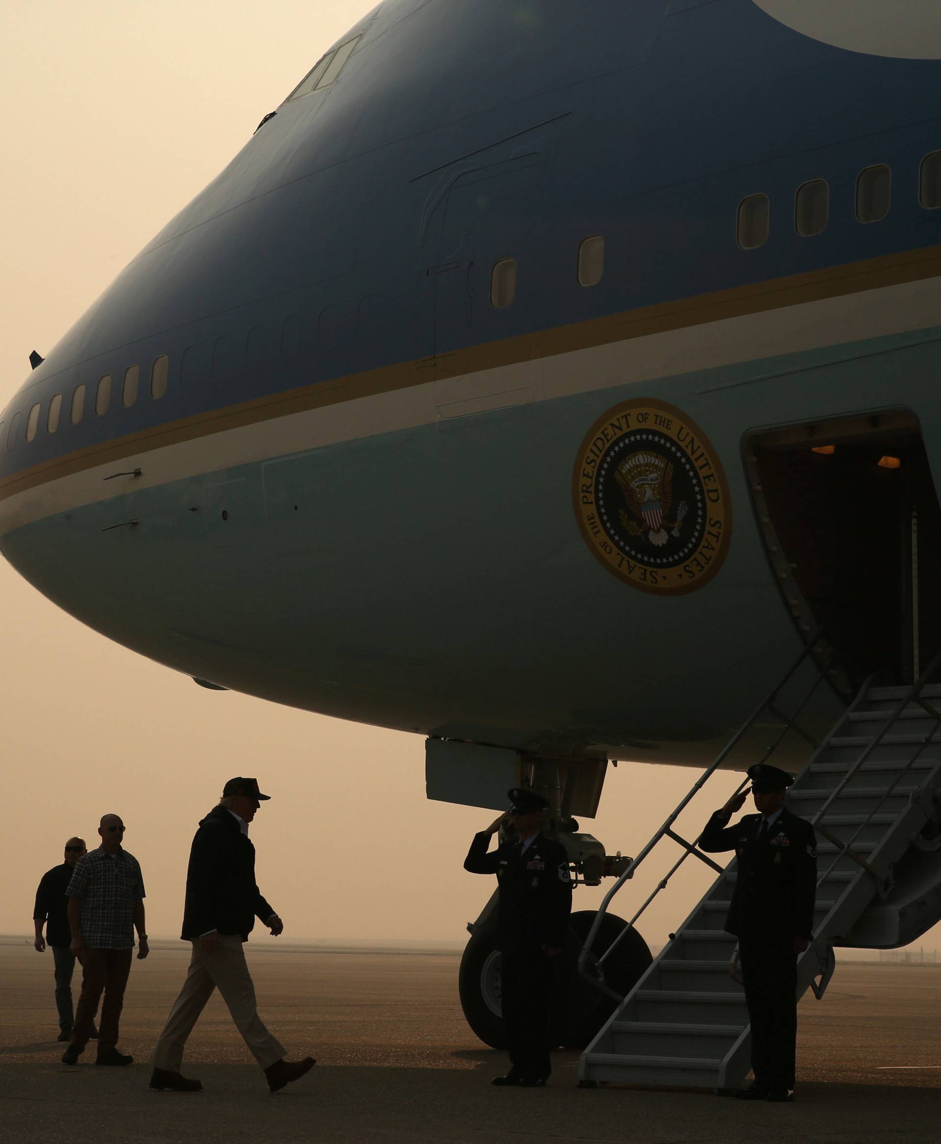 U.S. President Donald Trump boards Air Force One after visiting Paradise in California