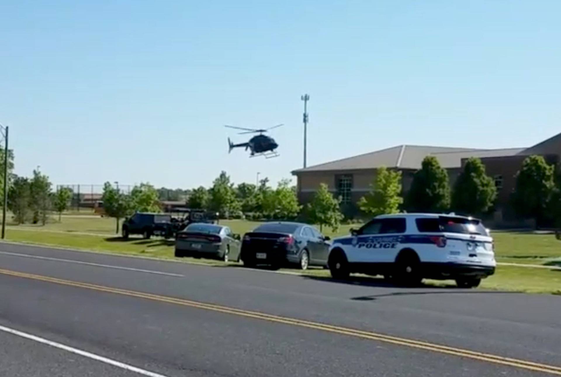 A helicopter lands near Noblesville West Middle School in Noblesville, Indiana