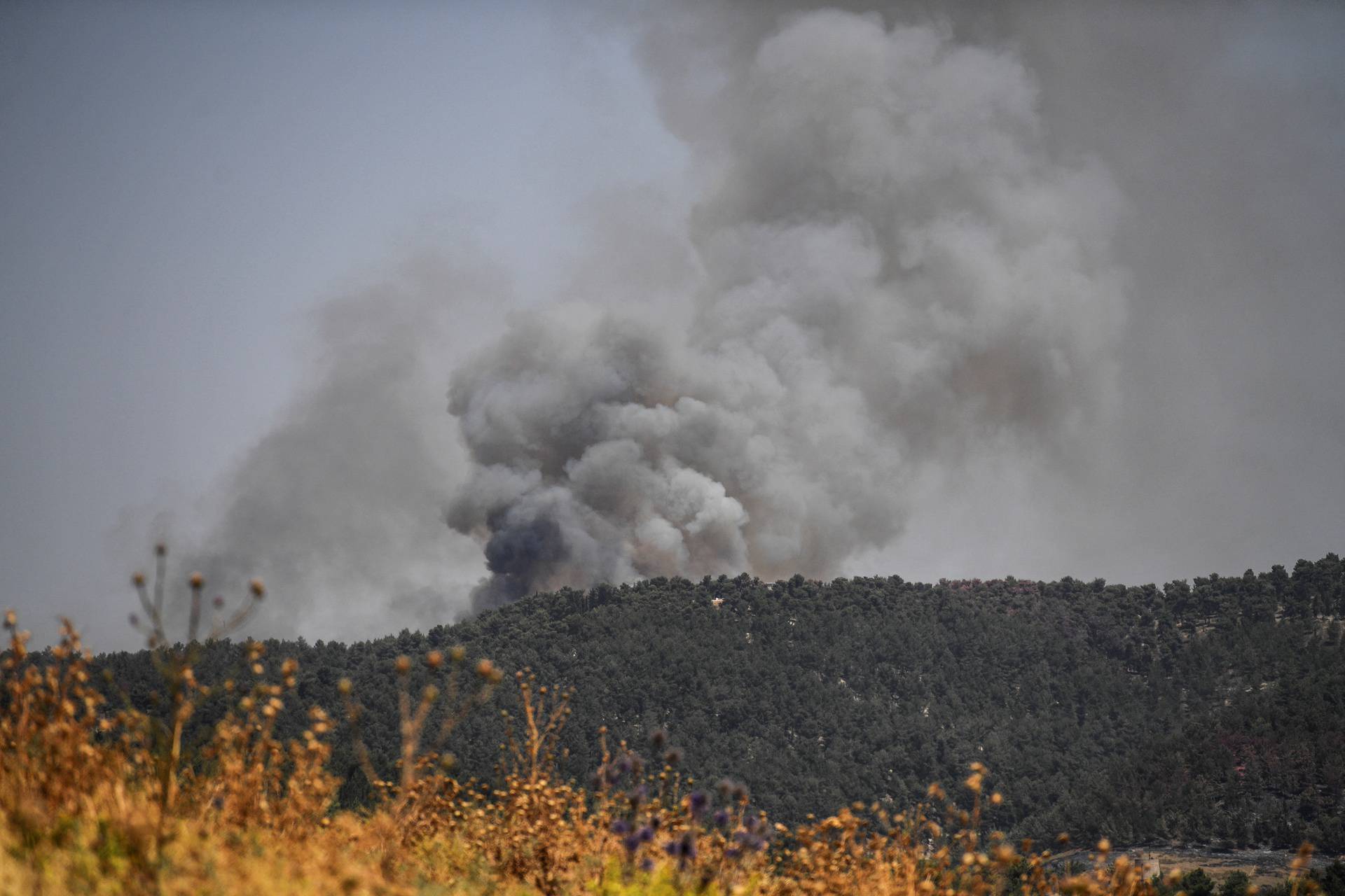 Smoke is seen following over border attacks from Lebanon, amid ongoing cross-border hostilities between Hezbollah and Israeli forces, close the Israeli border with Lebanon, on its Israel side