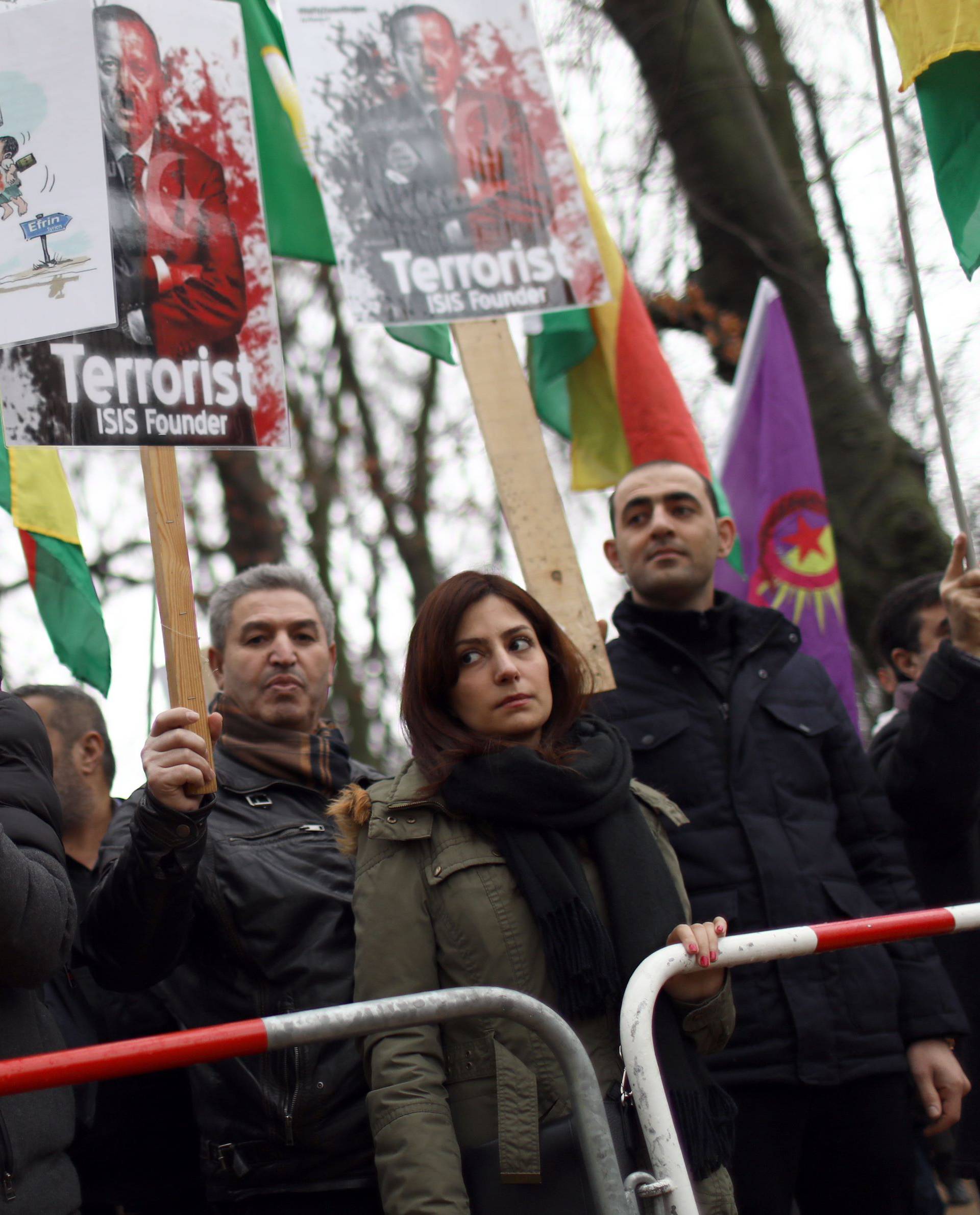 Pro-Kurdish protesters attend a demonstration outside the Turkish Embassy in Berlin