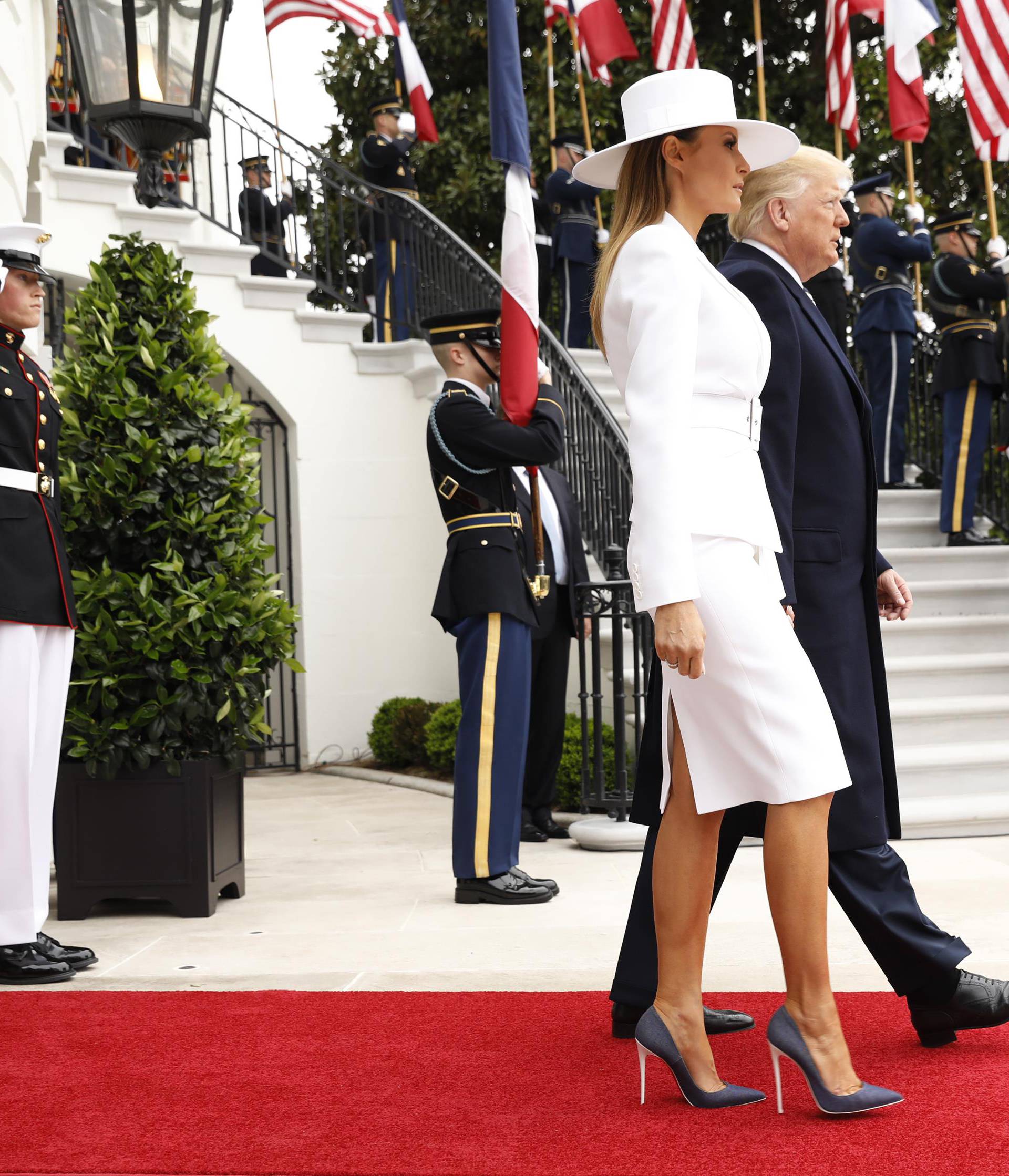 U.S. President Trump welcomes French President Macron during arrival ceremony at the White House in Washington