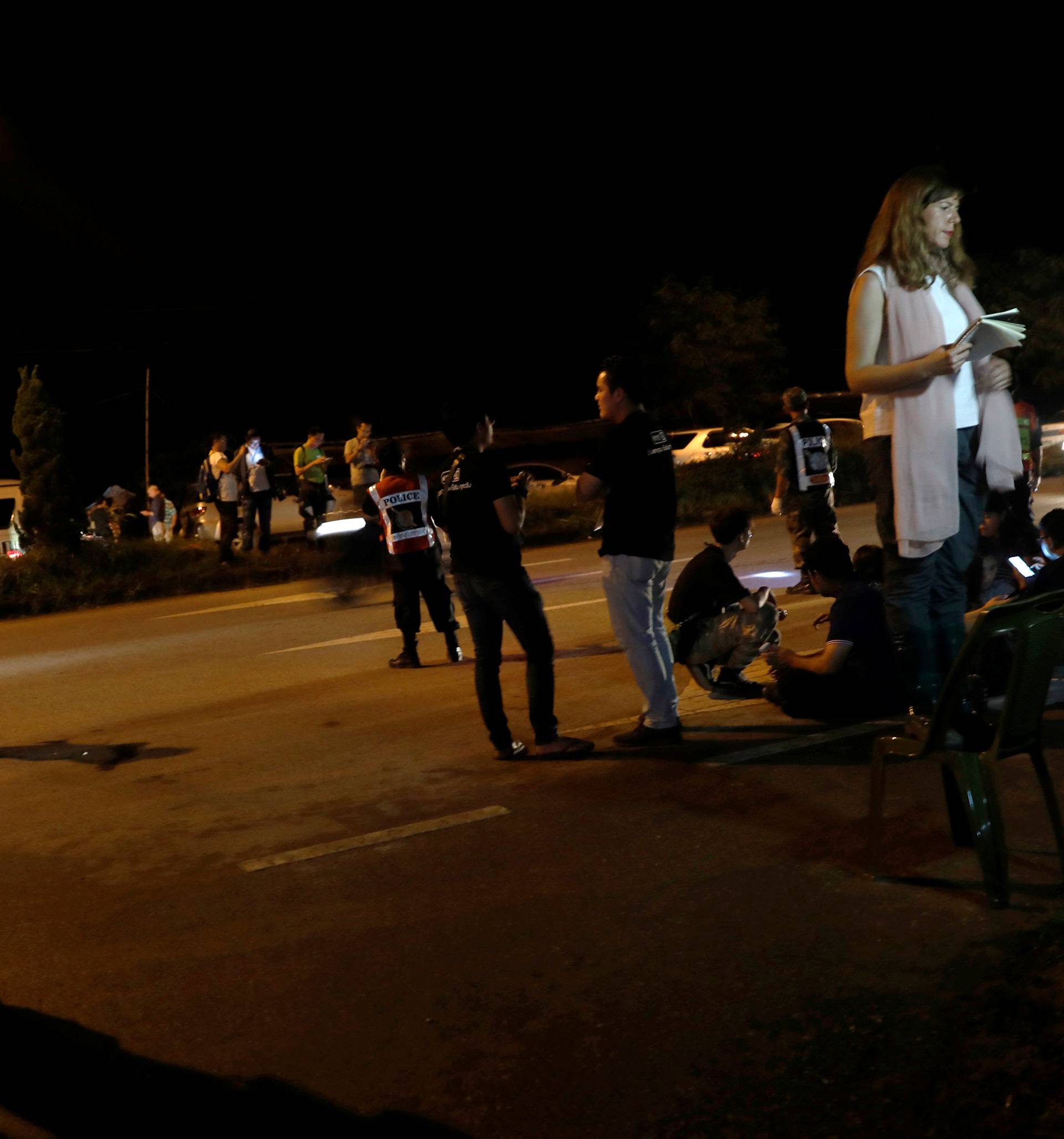 Journalist are seen reporting near Tham Luang cave complex in the northern province of Chiang Rai