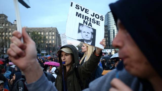 Protester attends a demonstration against the overwhelming victory of Serbia's Prime Minister Vucic in Serbia's presidential election in Belgrade