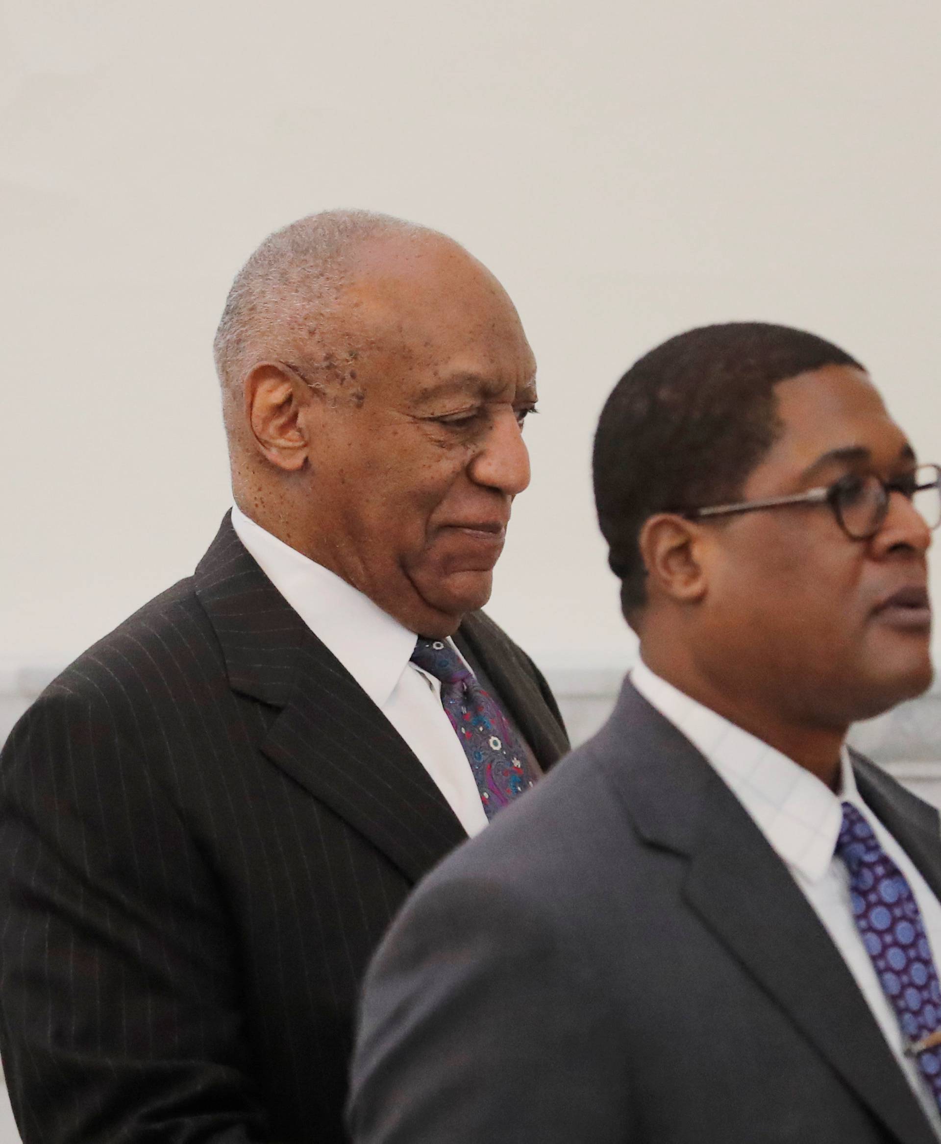 Actor and comedian Bill Cosby departs the courtroom during the first day of his sexual assault retrial at the Montgomery County Courthouse in Norristown, Pennsylvania