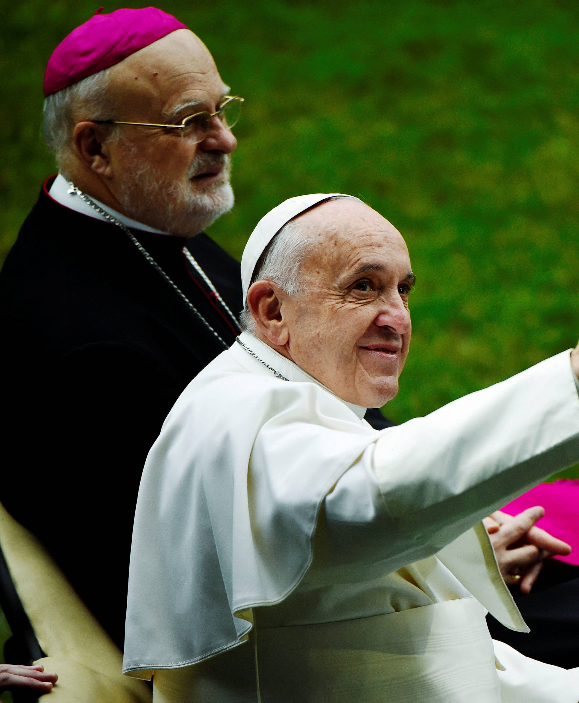 Pope Francis and Sweden's Catholic bishop Anders Arborelius arrive to Malmo arena for a Catholic mass