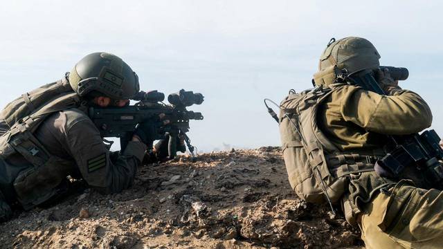 Israeli soldiers operate in the Gaza Strip amid conflict with Hamas