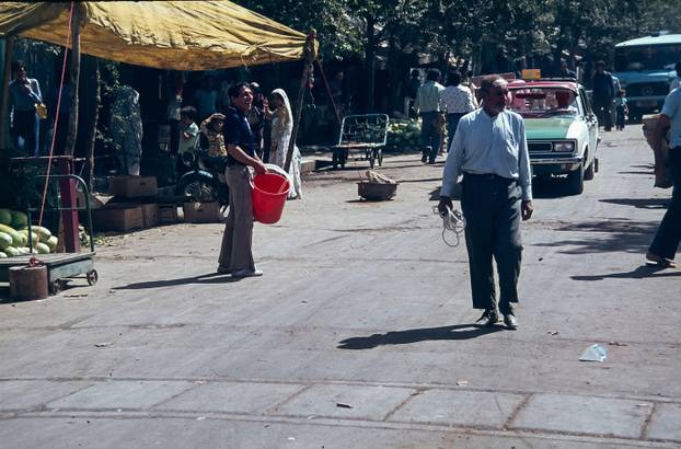 The image is of Shiraz, the 5th most populated city in Iran as it was in 1978 seen here in the souk, suq, market place. Shiraz is seen as a cultural city famed for its rose gardens, the home of the Persian Poet Saadi and the original source of the Shiraz 