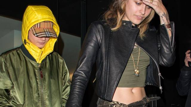 *PREMIUM-EXCLUSIVE* *MUST CALL FOR PRICING BEFORE USAGE-British Model Cara Delevingne and Paris Jackson giggled as they made a sneaky exit out of the back door of C restaurant