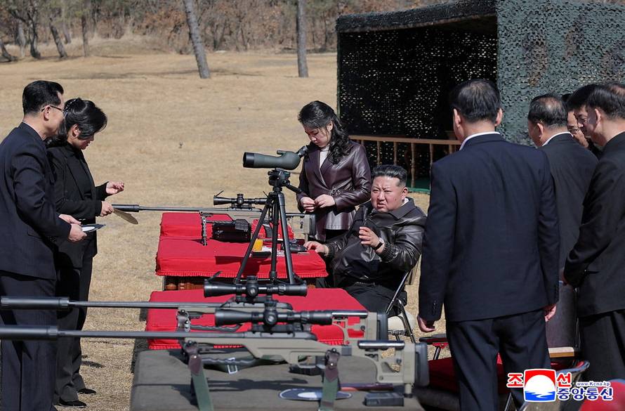 North Korean leader Kim Jong Un sits as he meets with leading officials and military commanders in Pyongyang