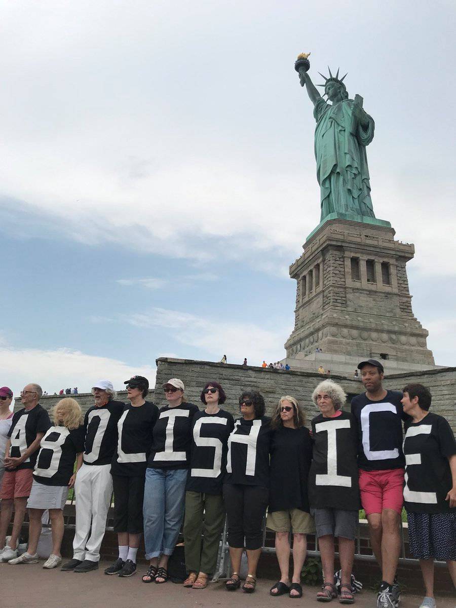 The group Rise and Resist stage a protest at the Statue of Liberty in New York