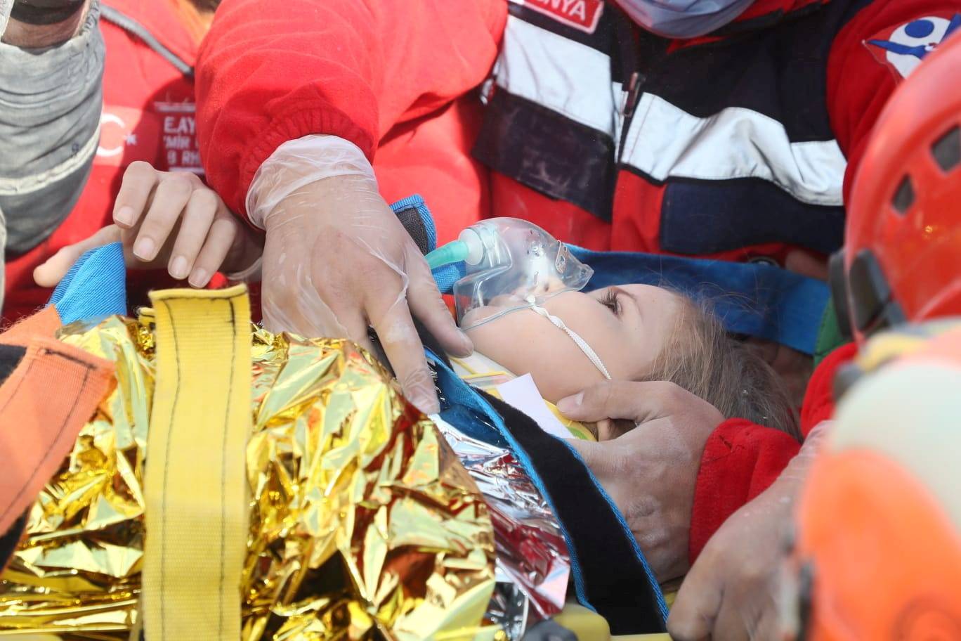 Rescue workers search for earthquake survivors in Izmir