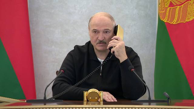 Belarusian President Alexander Lukashenko works at the Independence Palace in Minsk