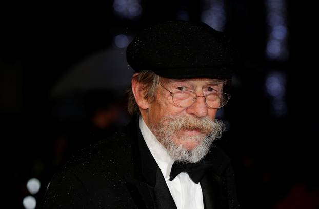 FILE PHOTO: Actor Hurt arrives for the European premiere of the film "The Imitation Game" at the BFI opening night gala at Leicester Square in London