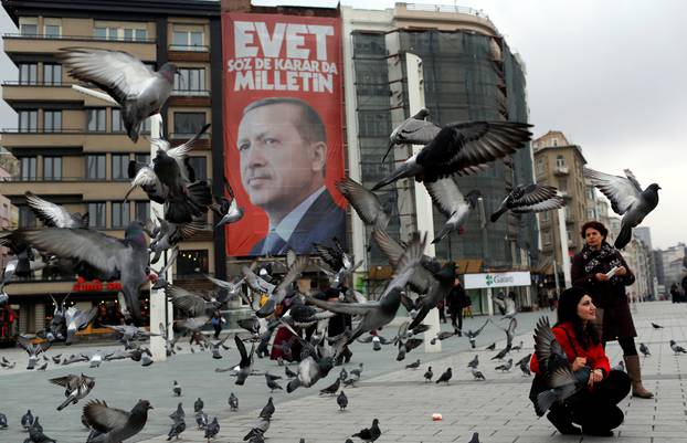 A campaign banner for the upcoming referendum with the picture of Turkish President Erdogan is seen on Taksim square in central Istanbul