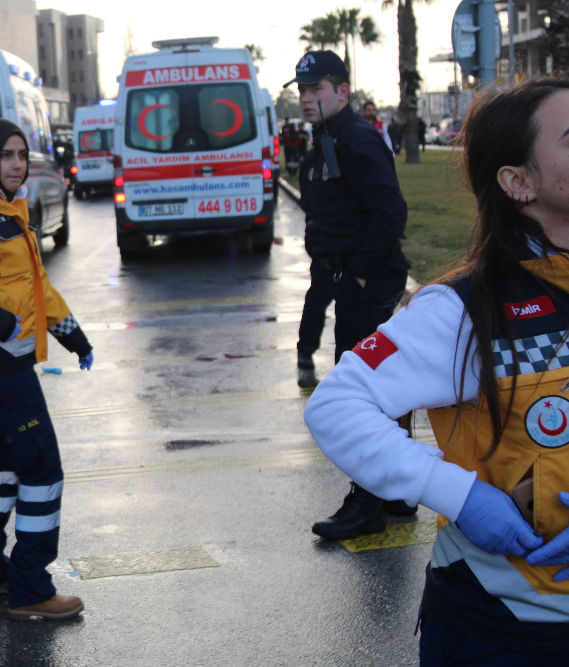 Medics arrive at the scene after an explosion outside a courthouse in Izmir