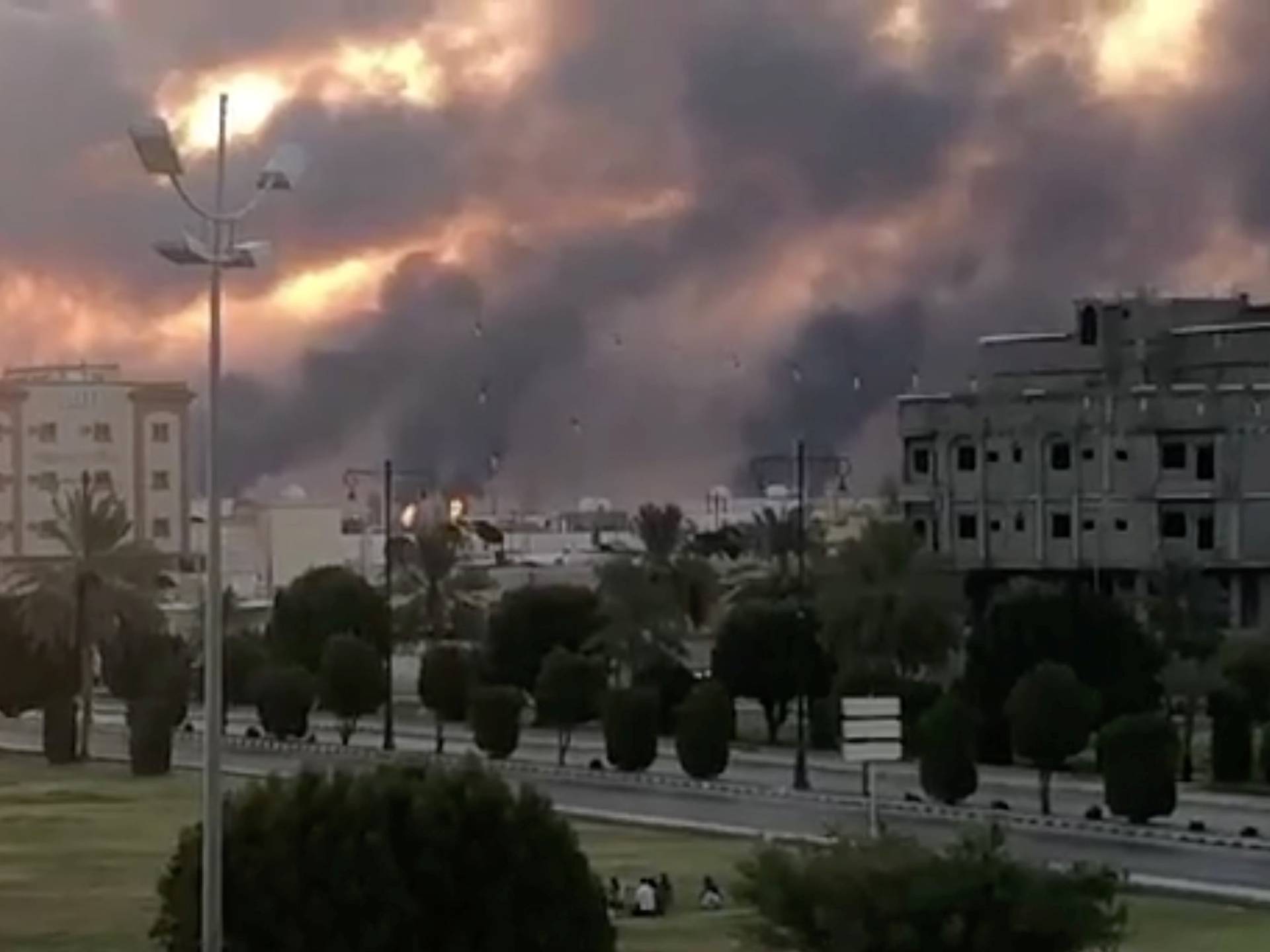 Smoke is seen following a fire at an Aramco factory in Abqaiq