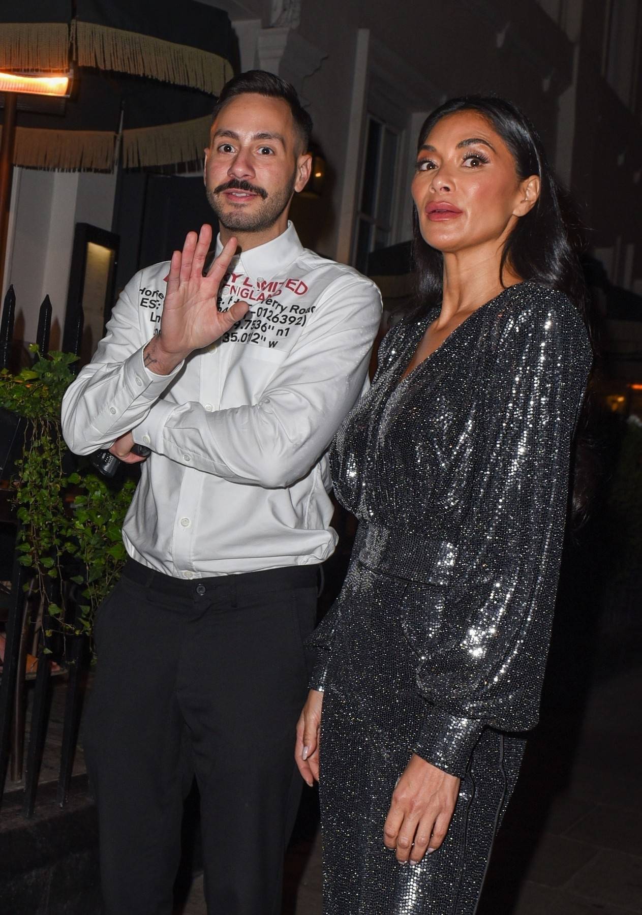 *EXCLUSIVE* The American Singer Nicole Scherzinger looked glamorous in her glizy silver dress during an evening out enjoying a spot of dinner in London's Soho.