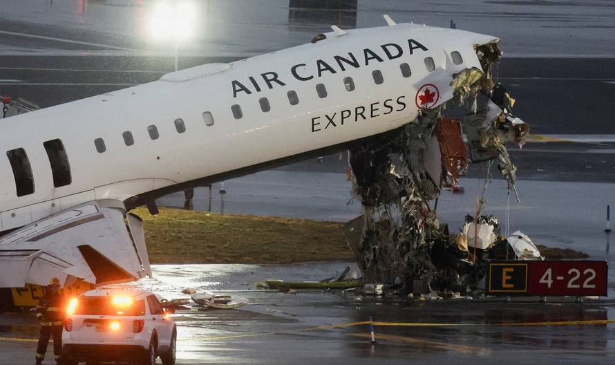 Air Canada Express jet collides with a ground vehicle at LaGuardia airport