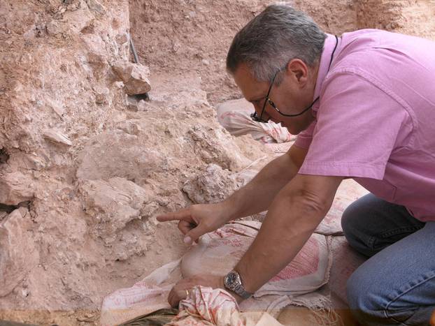 Dr. Jean-Jacques Hublin points out the new finds at Jebel Irhoud in Morocco in this handout photo