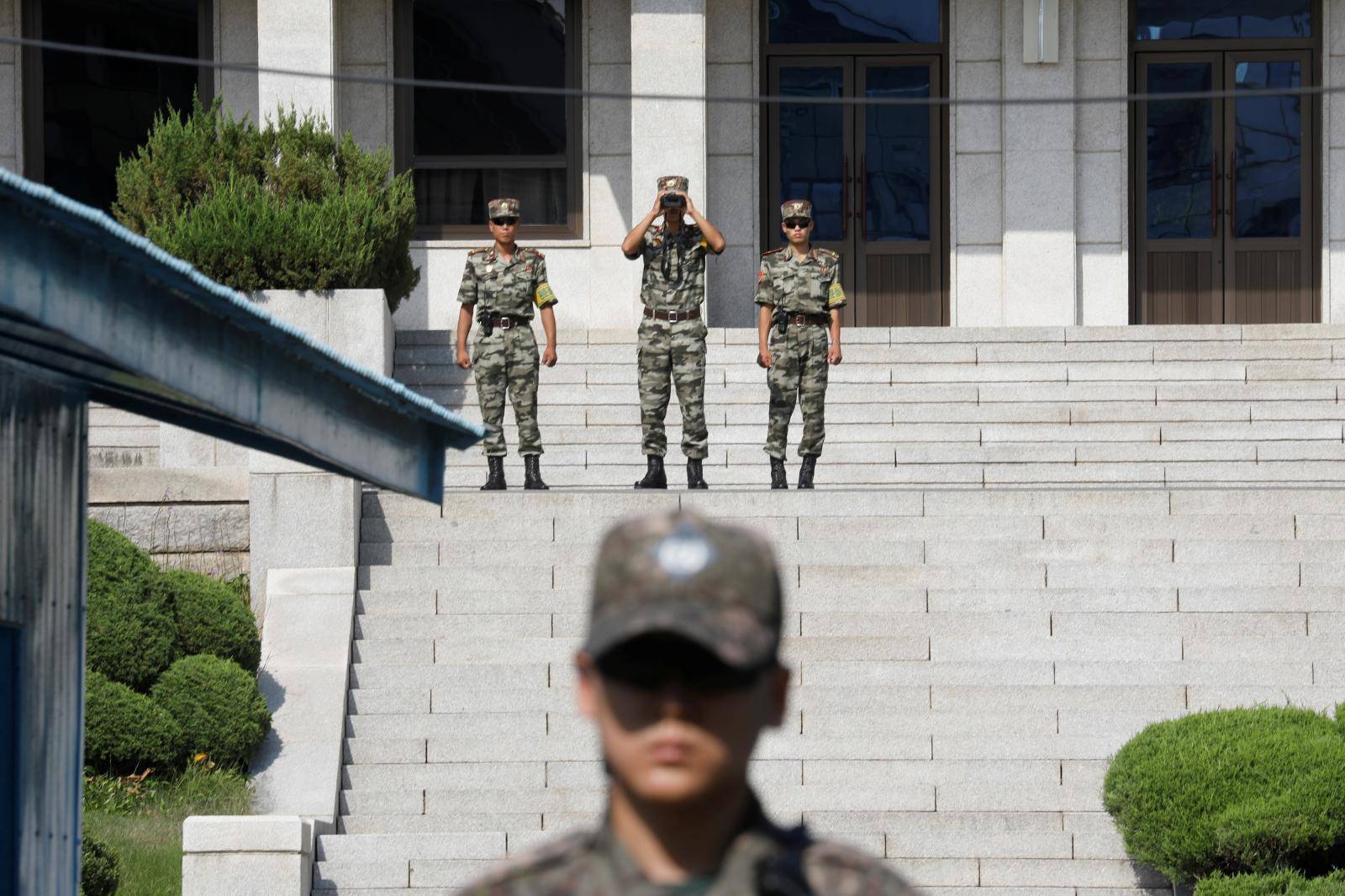 North Korean soldiers patrol in the truce village of Panmunjom