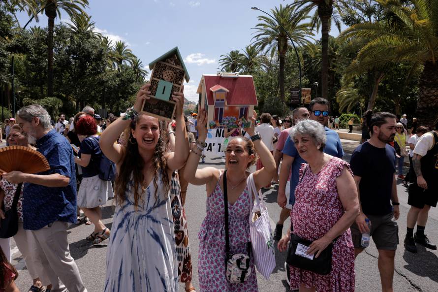 People demonstrate against mass tourism in Malaga