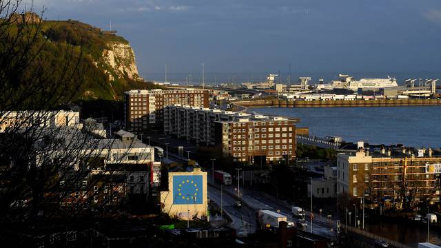 FILE PHOTO: A large mural depicting the EU flag being chipped away and attributed to the British artist Banksy is seen at the Port of Dover in south east Britain