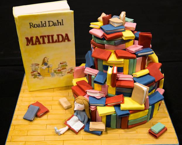 FILE PHOTO: A cake decorated in the style of the Roald Dahl children's book "Matilda" is displayed at the Cake and Bake show in London, Britain