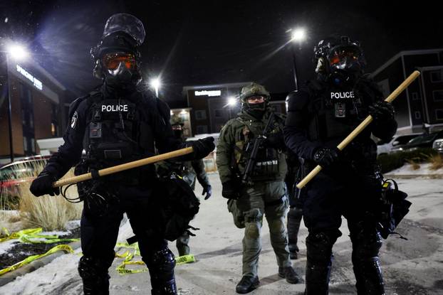 Protest outside the hotel where Bovino, who has been removed from his role, is reportedly staying, in Maple Grove