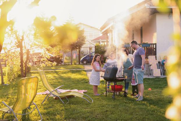 Picture,Of,Big,Happy,Family,Making,Barbeque,In,Their,Backyard.