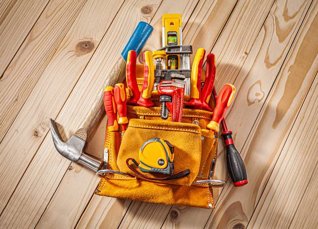 Set Of Construction Hand Tools In The form Of House Leather Tool