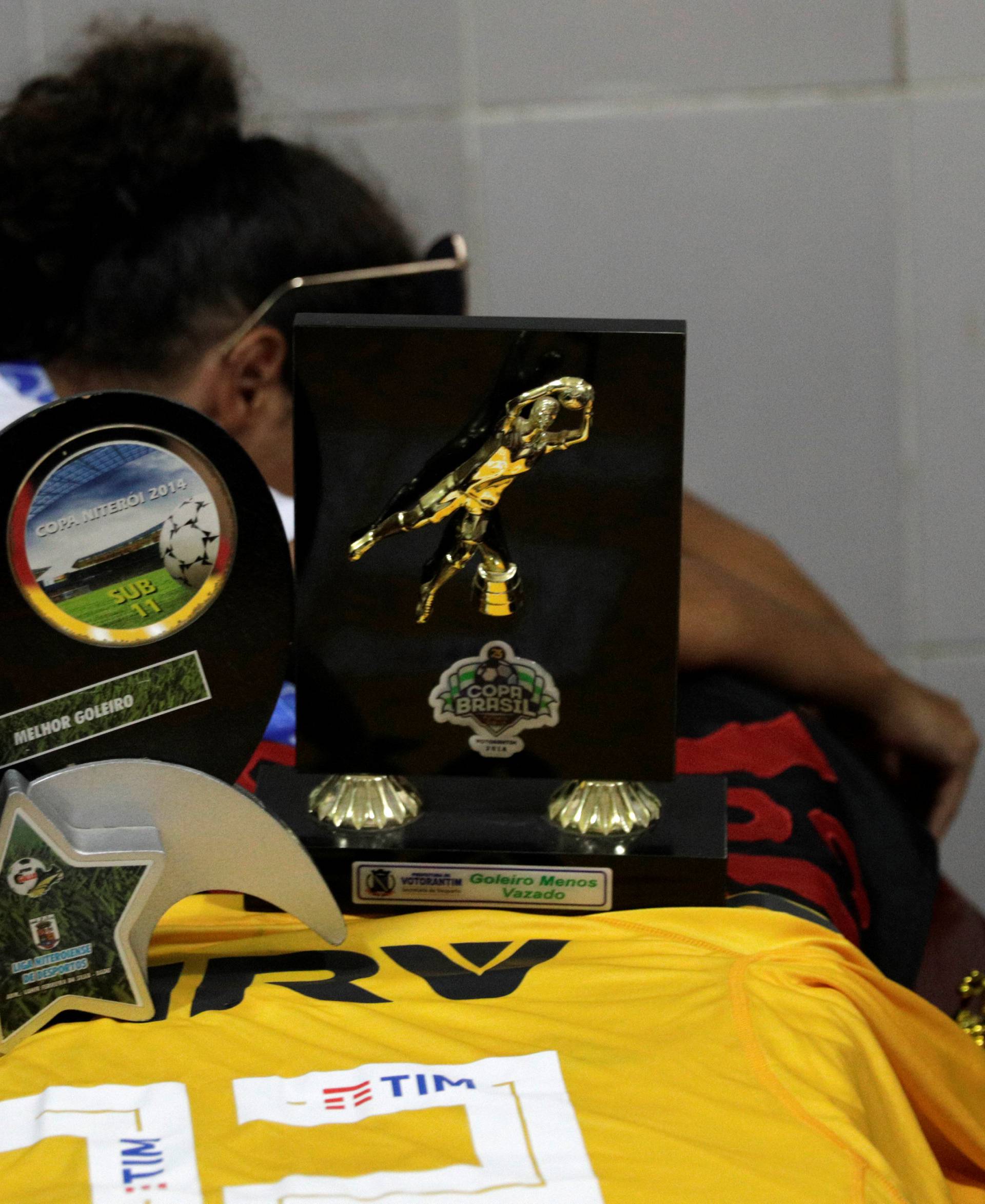 Relatives and friends of goalkeeper Christian Esmerio, 15, react during his funeral after a deadly fire at Flamengo soccer club's training center, in Rio de Janeiro