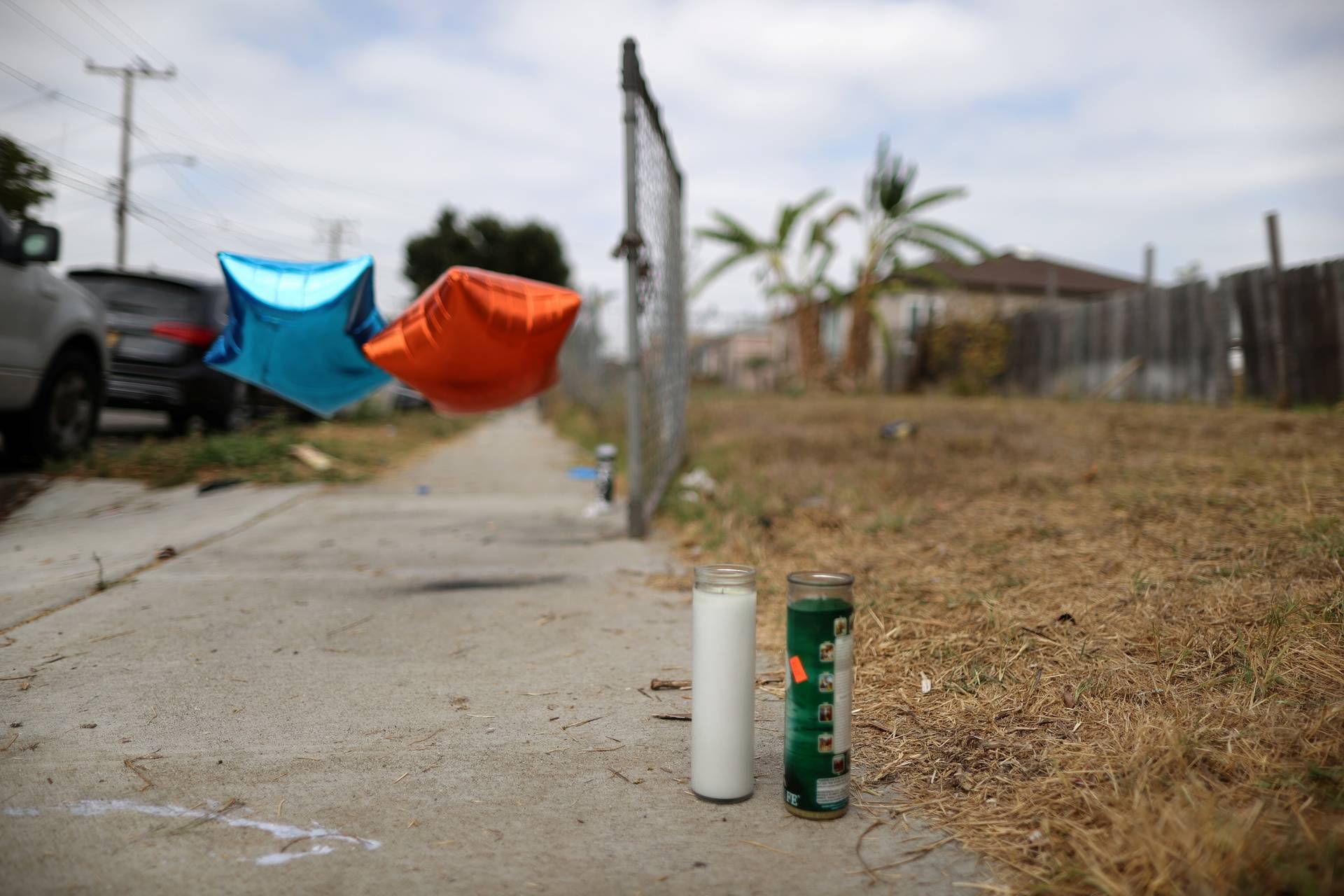 Candles are seen on the sidewalk where Dijon Kizzee, 29, was shot by Los Angeles sheriff’s deputies, in Los Angeles