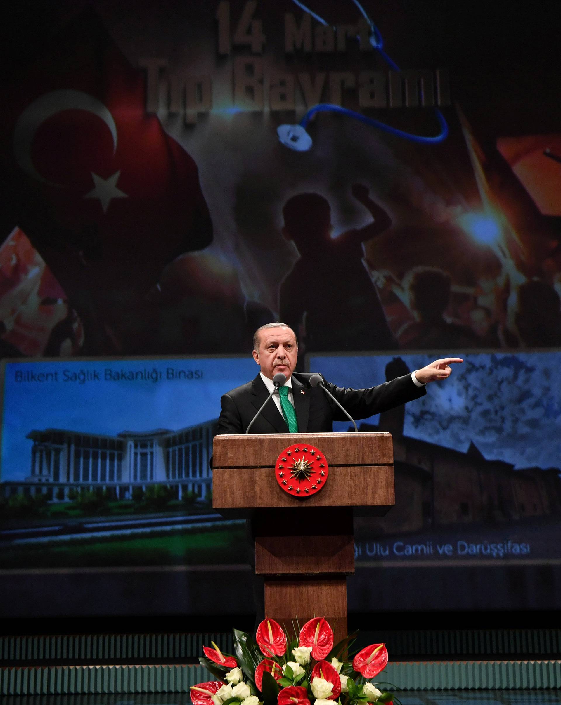 Turkish President Erdogan speaks during a meeting in Ankara