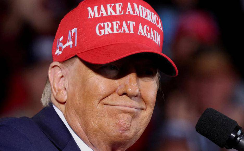 FILE PHOTO: Republican presidential nominee and former U.S. president Donald Trump holds a rally in Juneau