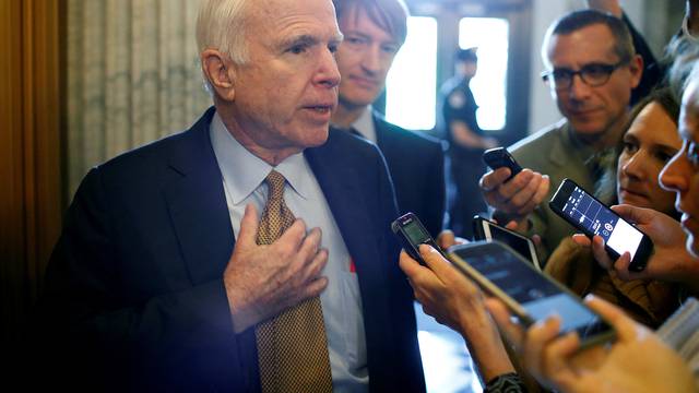 Senator John McCain speaks to reporters at the U.S. Capitol in Washington