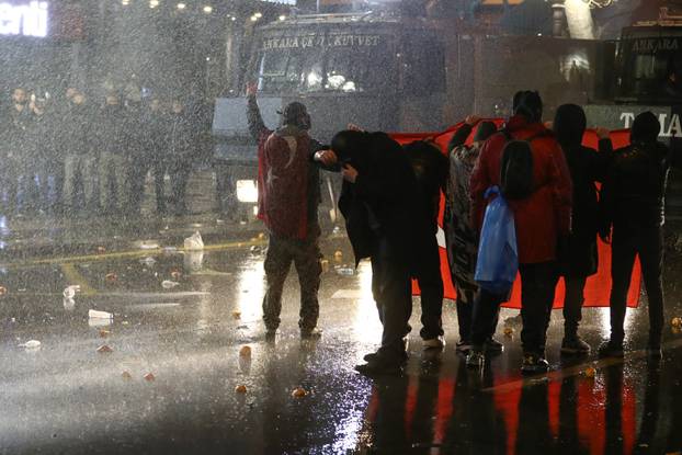People take part in a protest on the day Istanbul Mayor Imamoglu was jailed as part of a corruption investigation, in Ankara