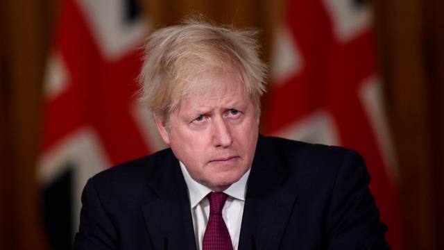 Britain's Prime Minister Boris Johnson holds a news conference in London