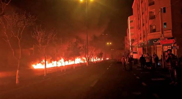 Fire burns along Tehran's Koohsar Boulevard