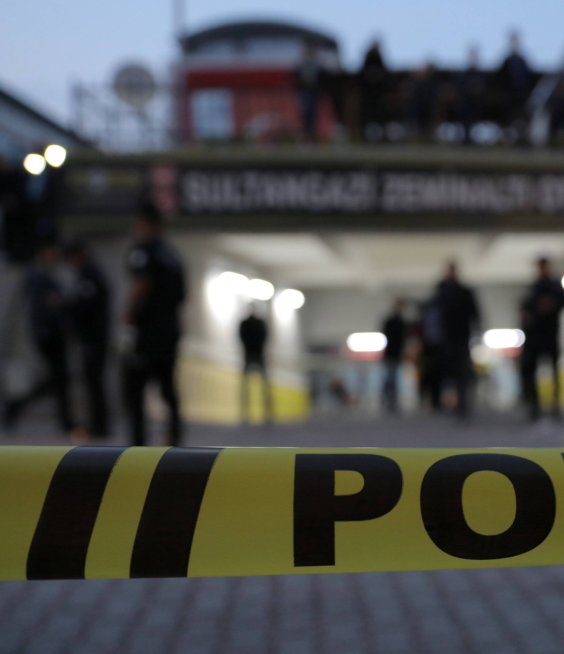 Turkish police officers stand guard outside a car park where a vehicle belonging to Saudi Arabia's consulate was found, in Istanbul