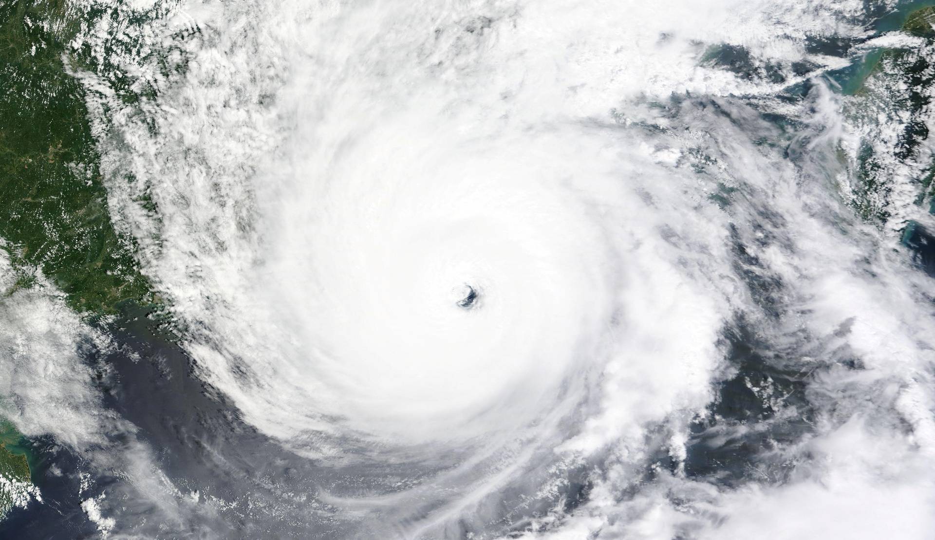 Satellite images show Typhoon Saola over Hong Kong