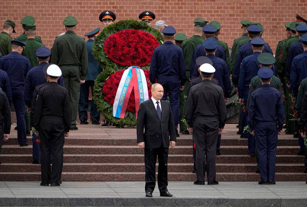 FILE PHOTO: Russian President Vladimir Putin attends a wreath-laying ceremony in Moscow